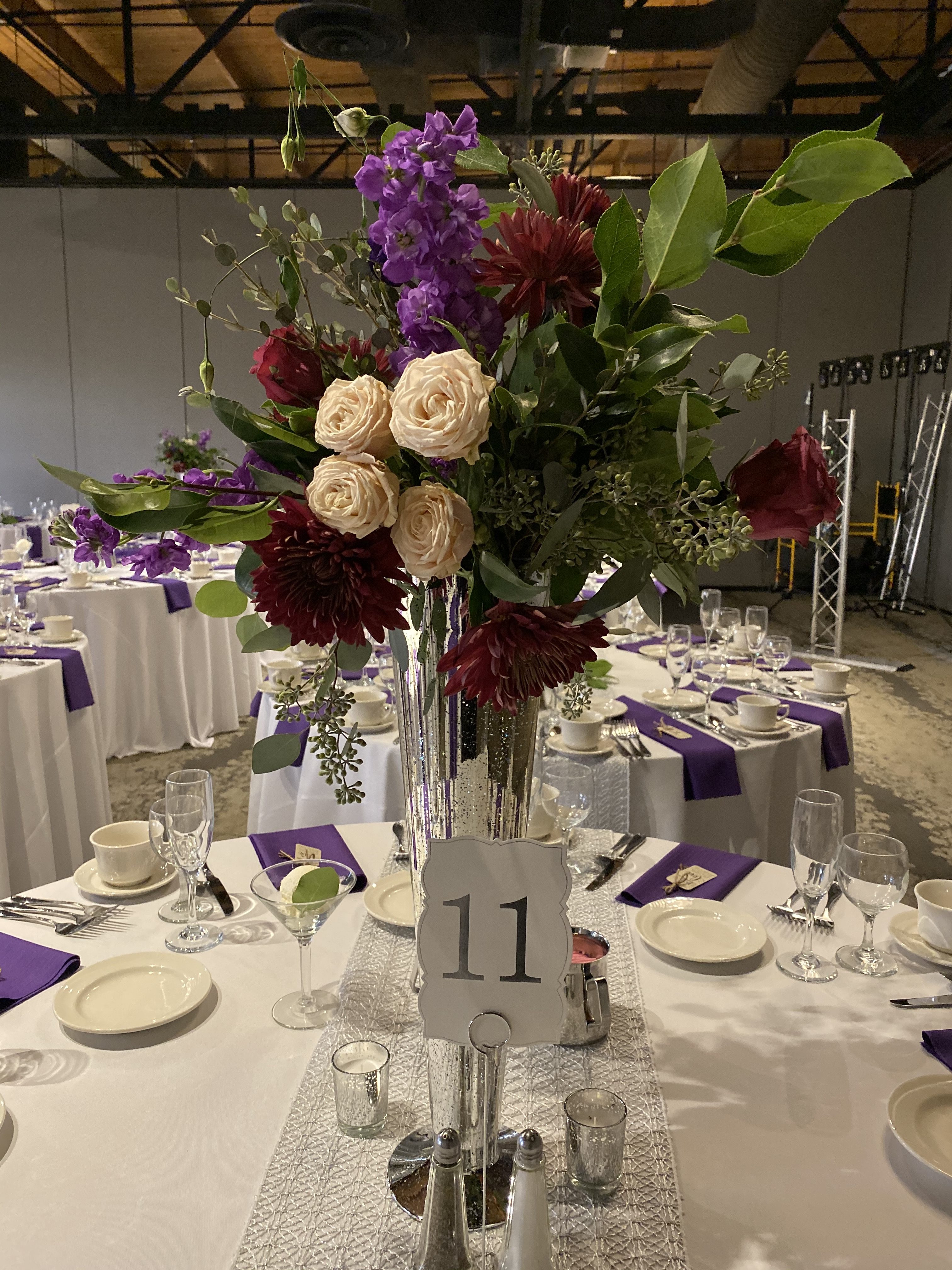 Floral Centerpieces created by Avalon Gardens accented the gorgeous linens provided by L'Nique.